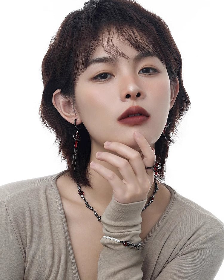 Taboo Four-pointed Star Tassel Earrings