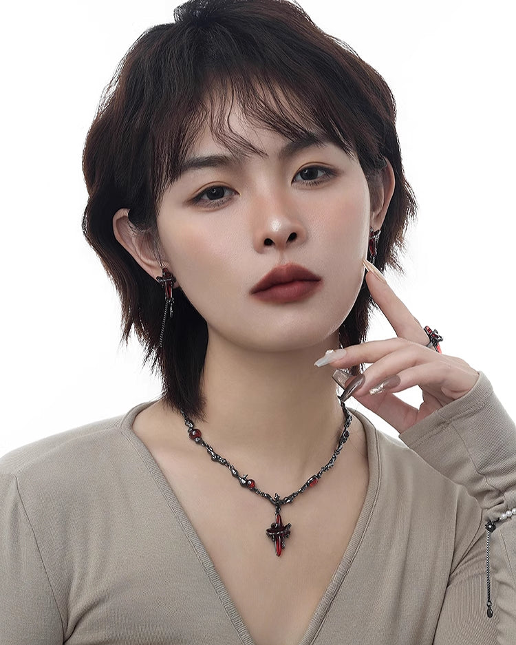 Taboo Four-pointed Star Tassel Earrings
